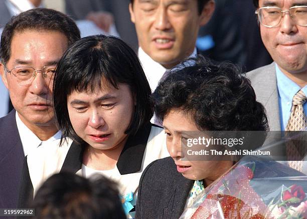Hitomi Soga and her sister Fumiko Suga are seen upon arrival at Haneda International Airport on October 15, 2002 in Tokyo, Japan. Five of 13 Japanese...