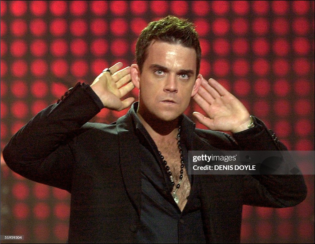 English singer Robbie Williams performs during the