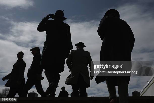 Racegoers enjoy the atmosphere on the first day of the Aintree Grand National Festival meeting on April 7, 2016 in Aintree, England. Today is the...