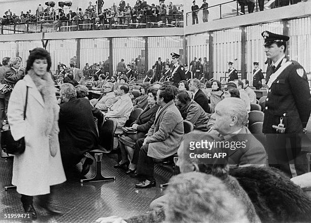 Picture taken 10 February 1986 shows the crowd in the courtroom inside the bunker built into the Ucciardone prison in Palermo as the big trial...