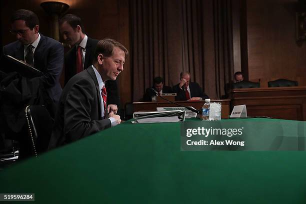 Director of the Consumer Financial Protection Bureau Richard Cordray waits for the beginning of a hearing before the Senate Banking, Housing and...