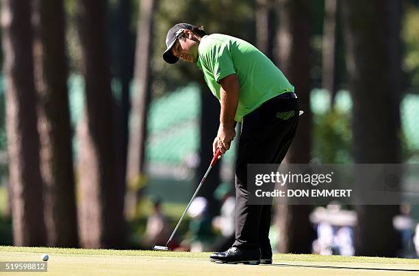 Golfer Patrick Reed putts on the 3rd green during Round 1 of the 80th Masters Golf Tournament at the Augusta National Golf Club on April 7 in...