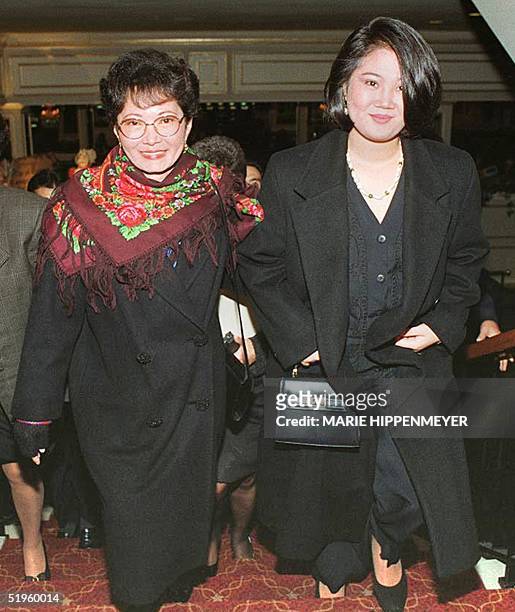 This June 1995 file photo shows Susana Higuchi , ex-wife of President Alberto Fujimori, accompanied by her daughter Keiko and acting First Lady of...