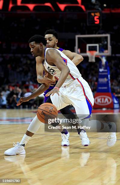 Wilcox of the Los Angeles Clippers dribbles past D'Angelo Russell of the Los Angeles Lakers during an NBA game between Los Angeles Clippers vs Los...