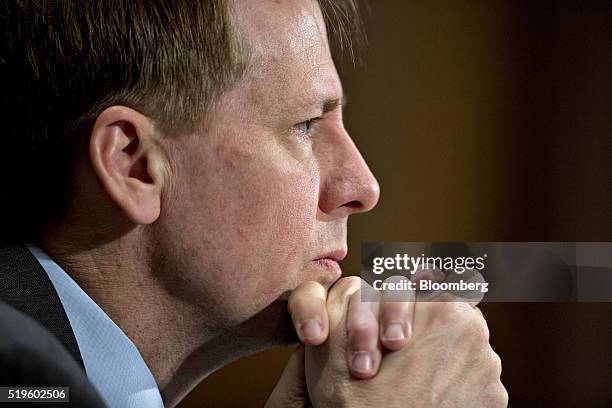 Richard Cordray, director of the Consumer Financial Protection Bureau , listens during a Senate Banking Committee hearing in Washington, D.C., U.S.,...