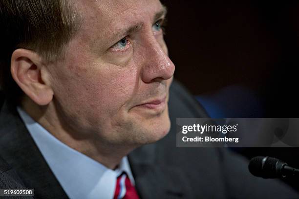 Richard Cordray, director of the Consumer Financial Protection Bureau , listens during a Senate Banking Committee hearing in Washington, D.C., U.S.,...