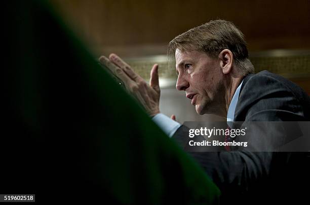 Richard Cordray, director of the Consumer Financial Protection Bureau , speaks during a Senate Banking Committee hearing in Washington, D.C., U.S.,...