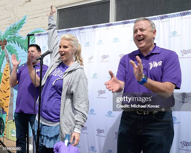 Viva Senior Brand Manager Sean Nobui, Actress and home/DIY Expert Monica Potter and Kimberly-Clark Chairman and CEO Tom Falk volunteer with Viva...