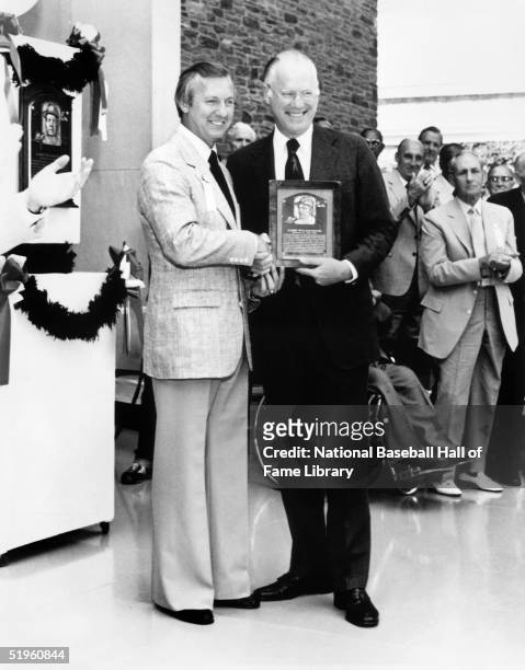 Hall of Fame inductee Al Kaline poses for a portrait with Baseball Commissioner Bowie Kuhn at his 1980 Induction Ceremony in Cooperstown, New York....