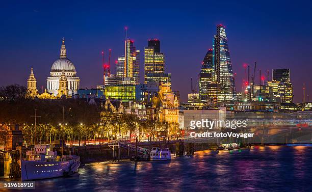 city of london glittering skyscrapers and st pauls illuminated night - london night stock pictures, royalty-free photos & images