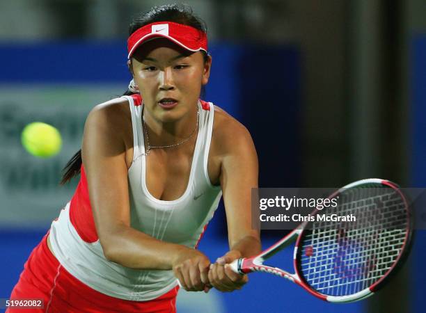 Shuai Peng of China in action against Alicia Molik of Australia during day six of the Medibank Private International on January 14, 2005 at Sydney...