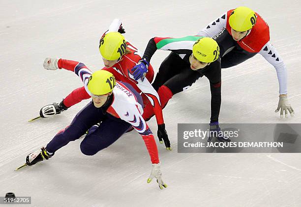 Russia's Alexander Gertsikov, Poland's Jakub Jaworski, Bulgaria's Assen Pandov and Nederland's Niels Kerstholt takes a curve of the seventh 1500m Men...