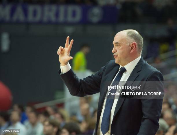 Real Madrid's coach Pablo Laso signals instructions to players during the Euroleague group F top 16 round 14 basketball match Real Madrid vs Khimki...