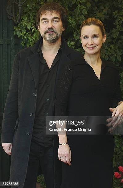 French director Olivier Marchal and his wife actress Catherine Marchal attend a photocall to promote their new movie "36" at the Hotel Eden Terrace...