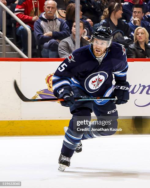 Matt Halischuk of the Winnipeg Jets keeps an eye on the play during second period action against the Chicago Blackhawks at the MTS Centre on April 1,...