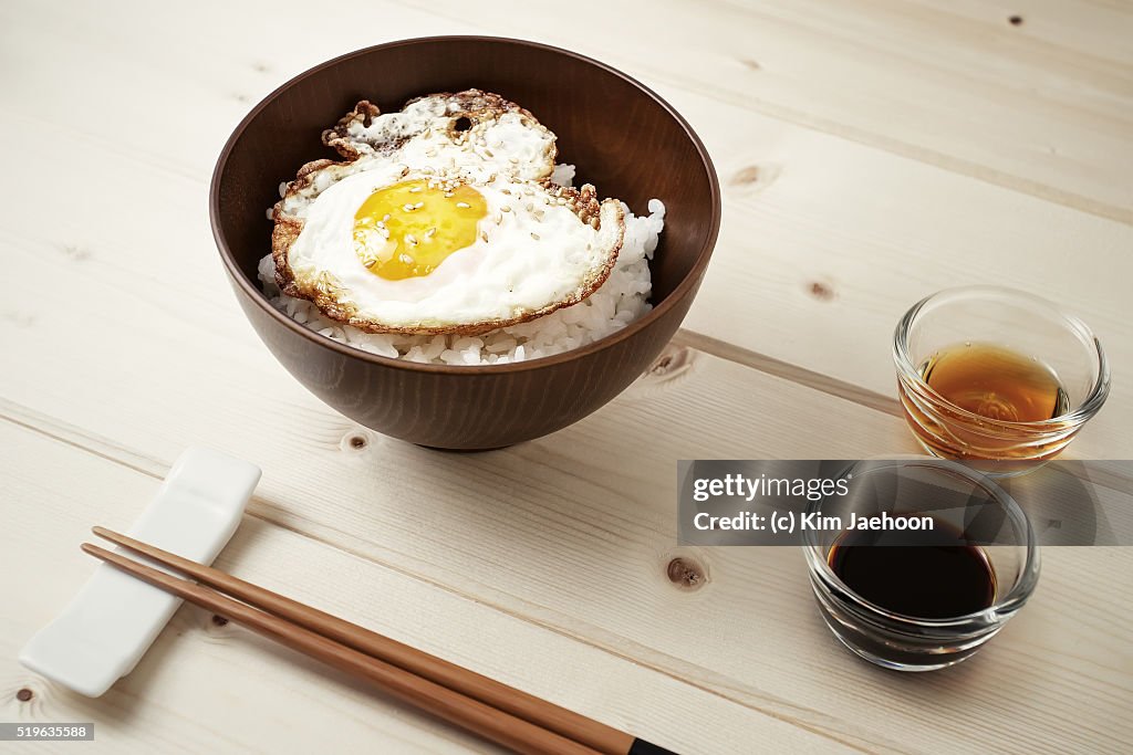 Fried egg on rice with sesame oil & soy seasoning