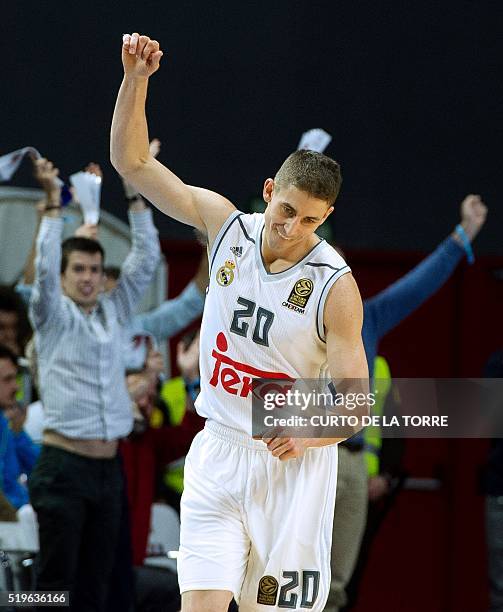 Real Madrid's US guard Jaycee Carroll celebrates after scoring during the Euroleague group F top 16 round 14 basketball match Real Madrid vs Khimki...