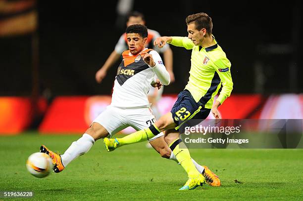 Pedro Santos of SC Braga challenges Taison of Shakhtar Donetsk during the UEFA Europa League Quarter Final first leg match between SC Braga and...