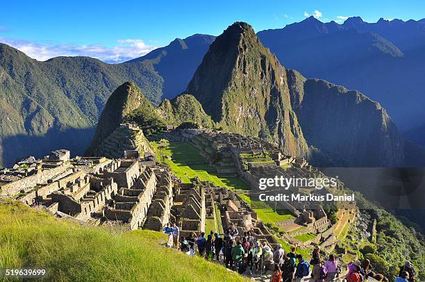 machu picchu with tourists - machu pichu stock pictures, royalty-free photos & images