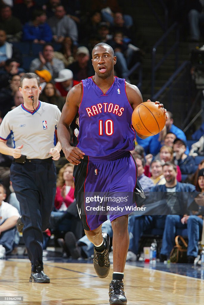 2005 Toronto Raptors Milt Palacio of the Toronto Raptors runs the ball down the court ...
