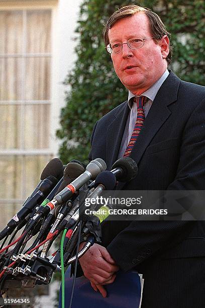 Protestant Unionist leader David Trimble speaks to reporters outside the White House following his meeting with US National Security advisor Sandy...