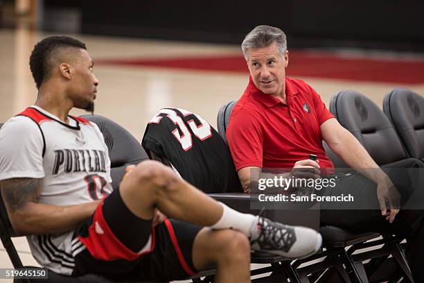 Portland Trail Blazers general manager Neil Olshey and Damian Lillard of the Portland Trail Blazers participate in practice March 30, 2016 at the...