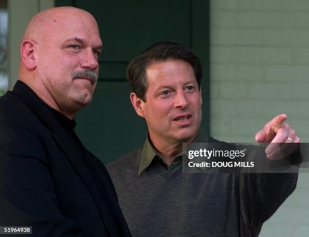 Democratic presidential candidate and US Vice President Al Gore talks with Minnesota Gov. Jesse Ventura on the porch of the vice president's...