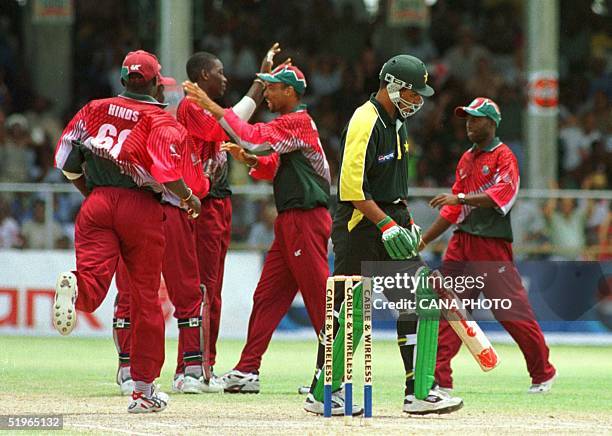 Pakistani batsman Waqar Younis is caught by West Indies wicket keeper Ridley Jacobs 19 April 2000, bowled Chris Gayle at the First Cable &amp;...