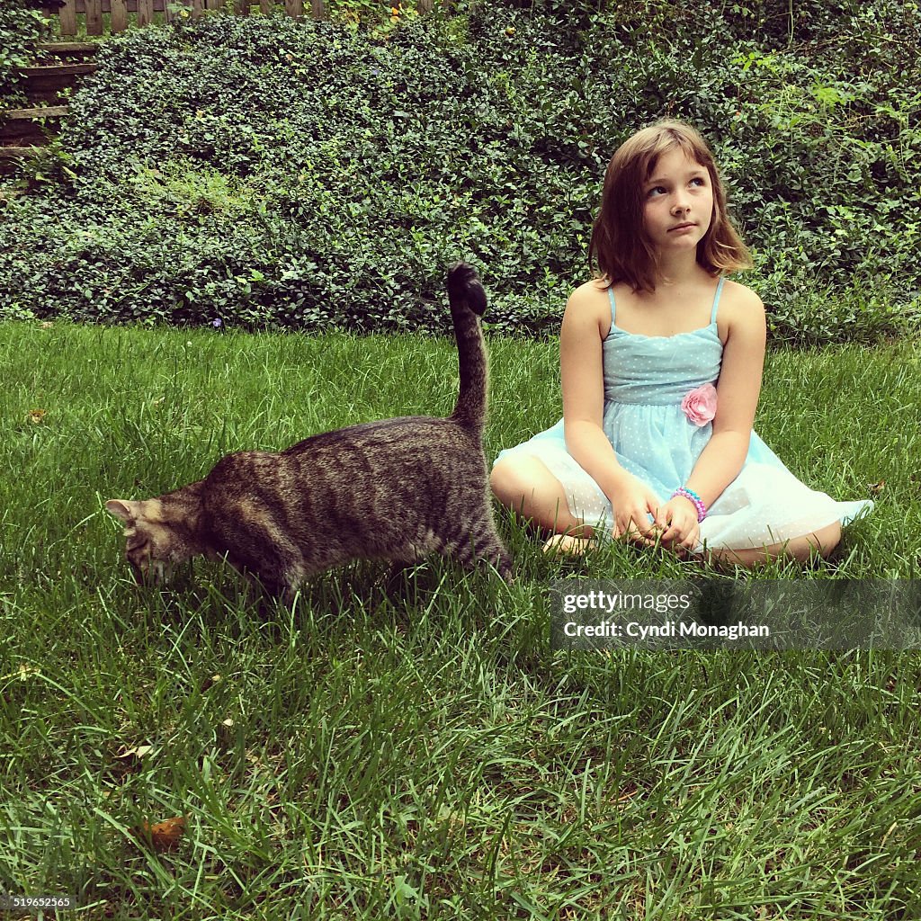 Girl in Blue Dress with Cat