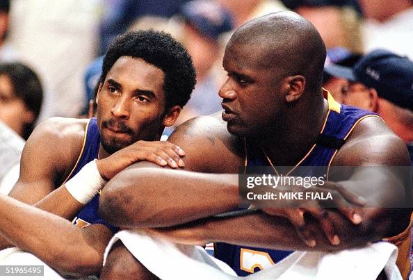 Los Angeles Lakers forward Kobe Bryant (L) speaks Los Angeles Lakers forward Kobe Bryant (L) speaks