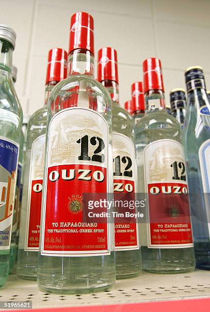 Bottles of imported Ouzo 12 Greek liquor are seen displayed at the Greek Columbus Foods market January 14, 2005 in Des Plaines, Illinois. A US...