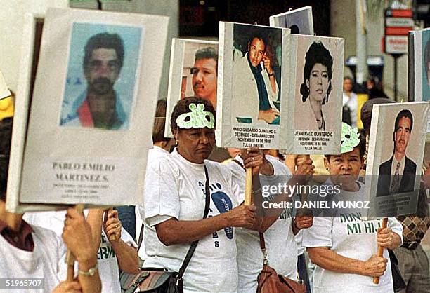 Families of missing and kidnapped persons hold a protest demanding their release in Medellin, Colombia, 02 June 2000. Two hundred people participated...