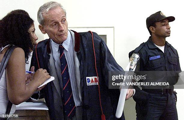 French monk and lawyer Henri Burin des Roziers, speaks with a journalist during the trial of Jeronimo Alves de Amorin in Belem, Brazil 06 June, 2000....