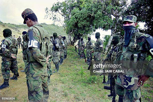 Members of a paramilitary group of the United Auto-Defense Forces of Colombia have military exercises in Cali, about 480 km from Bogota, 12 June,...
