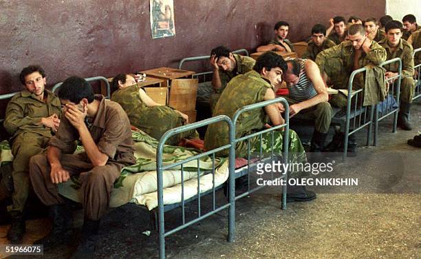 Military prisoners, members of the Abkhasian National Guard, sit in a Georgian Army jail in Sukhumi, capital of breakaway Abkhazia autonomous...