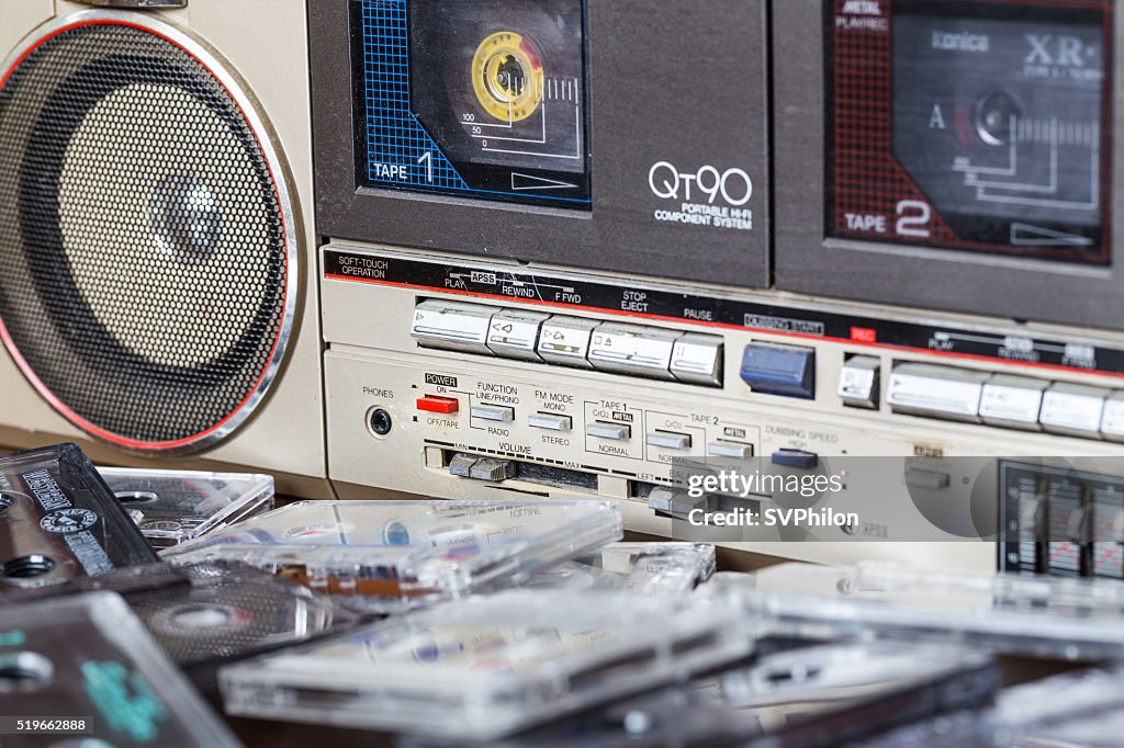Old cassette tape recorder Sharp with cassettes.