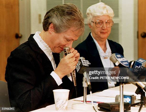 Sister Mildred Gross, Provincial of the Adorers of the Blood of Christ convent in Ruma, IL, cries 31 October 1992 during a news conference on the...