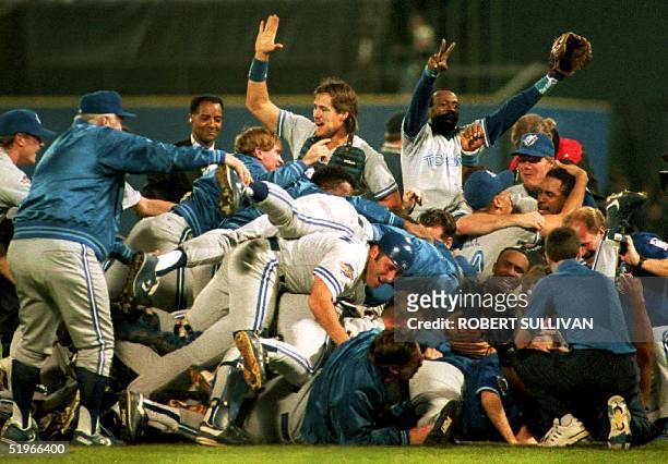 The Toronto Blue Jays celebrate their victory early 25 October, 1992 after winning the 1992 World Series in Atlanta, GA. Blue Jays catcher Pat...