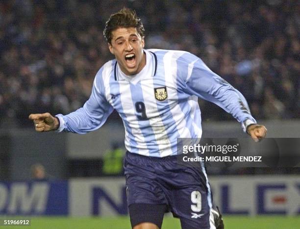 Argentina's Hernan Crespo celebrates his first goal against Ecuador 19 July during their Japan-Korea 2002 World Cup qualification game at Monumental...