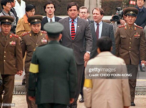 Representative Bill Richardson of New Mexico crosses the border from North to South Korea in Panmunjom 22 December prior to the North Korean handover...