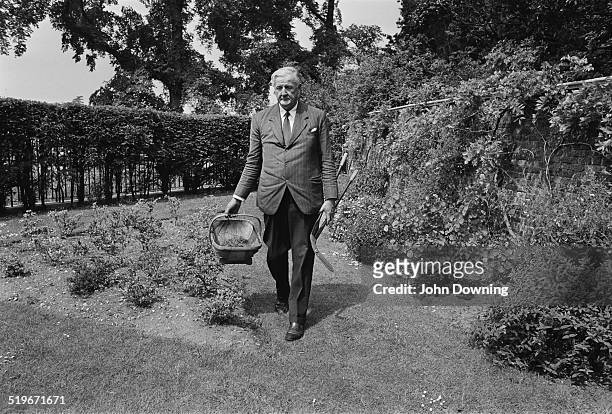 Chairman of Daily Mirror Newspapers, Sunday Pictorial Newspapers, and International Publishing Corporation, Cecil Harmsworth King in the garden of...