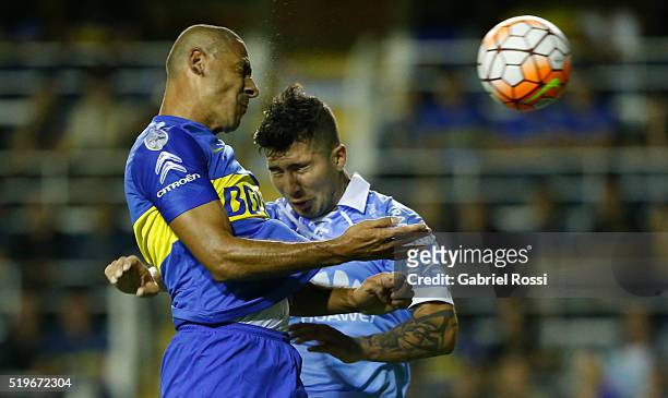 Daniel Alberto Diaz of Boca Juniors heads the ball during a match between Boca Juniors and Bolivar as part of Group 3 of Copa Bridgestone...