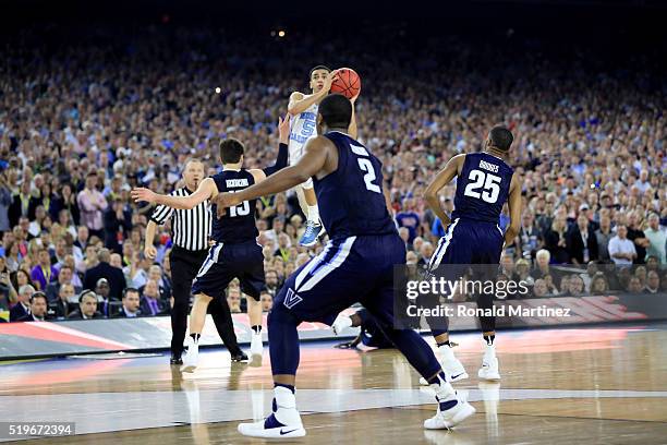 Marcus Paige of the North Carolina Tar Heels shoots a three-pointer to tie the game with 4.7 seconds left in the second half against the Villanova...