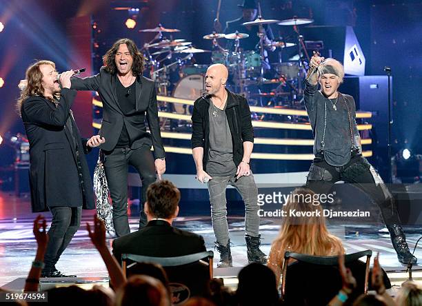 Recording artists Caleb Johnson, Constantine Maroulis, Chris Daughtry and James Durbin perform onstage during FOX's "American Idol" Finale For The...