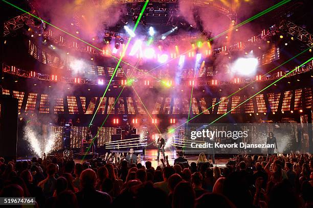 Recording artists Caleb Johnson, Constantine Maroulis, Chris Daughtry and James Durbin perform onstage during FOX's "American Idol" Finale For The...