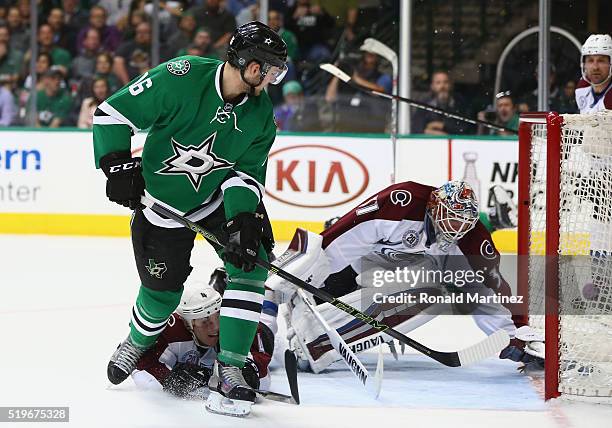 Jason Dickinson of the Dallas Stars scores his first career NHL goal on his first NHL career shot against the Colorado Avalanche in the first period...