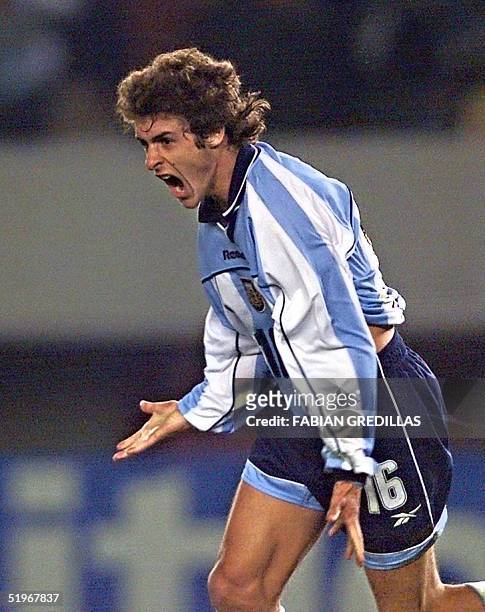 Pablo Aimar of Argentina celebrates his team's first goal during their 2002 Japan-Korea World Cup qualifying match against Paraguay 16 August 2000 at...