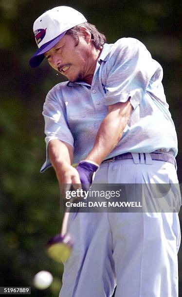 Jumbo Ozaki of Japan hits his tee shot on the fifth hole 19 August, 2000 during the third round of the 82nd PGA Championship at Valhalla Golf Club in...