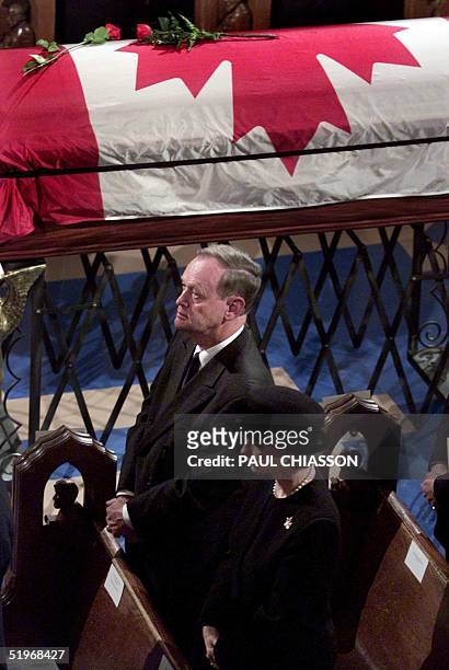 Canadian Prime Minister Jean Chretien and his wife Aline attend the state funeral for former Prime Minister Pierre Trudeau at Notre-Dame Basilica in...