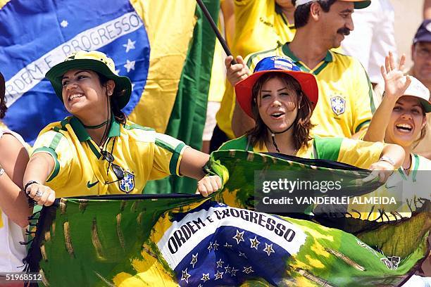 Braailian soccer fans fans dance samba at the Jose Encarnacion Romero stadium in Maracaibo, Venezuela, 08 October 2000, before the game between...